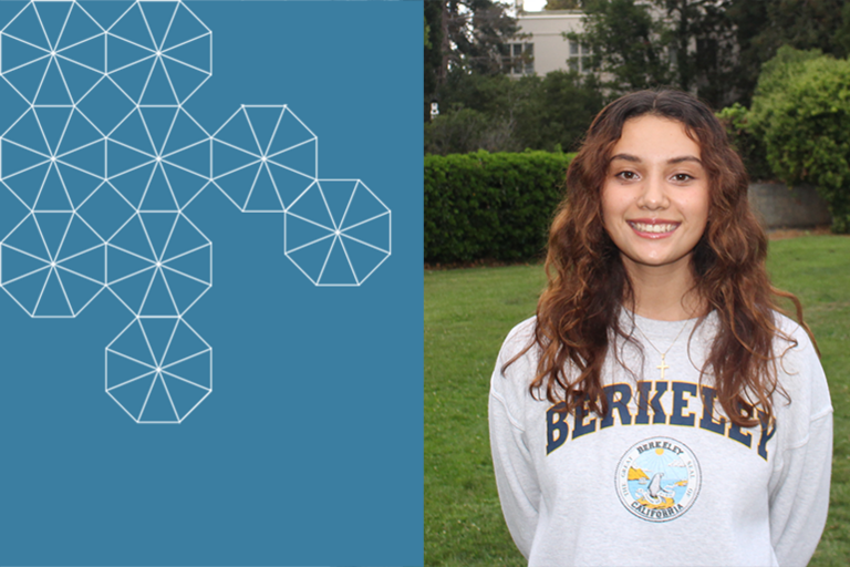 Student assistant on the UC Berkeley campus smiles, facing the camera wearing a Berkeley sweatshirt