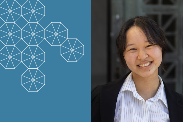 Student Assistant Cindy Chen, smiling in a dark blazer and white striped button up.