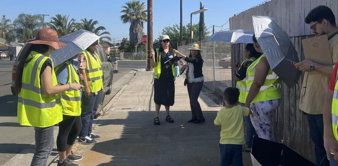 A facilitator leads a walking and biking assessment in Tulare, California.