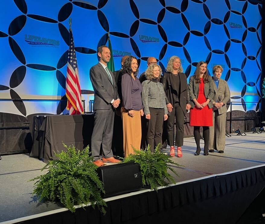 Group photo of the 2023 NHTSA Public Service Awardees on stage at the LifeSavers Conference