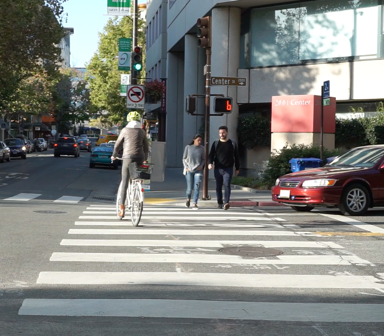 People walking and biking in downtown Berkeley