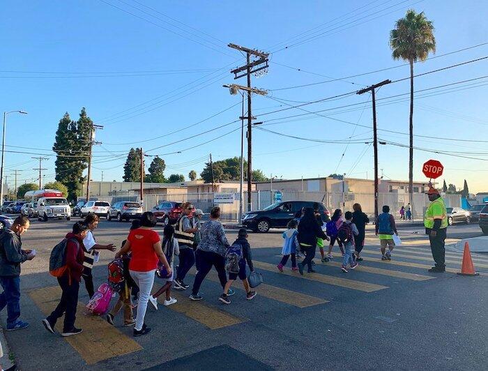 Watts Walking Club conducting a neighborhood walk for community safety