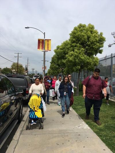 The planning committee conducting the walking assessment during the Boyle Heights CPBST Site Visit.